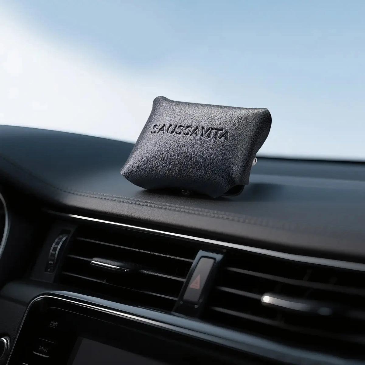 SAUSSAVITA black leather car diffuser on sleek dashboard