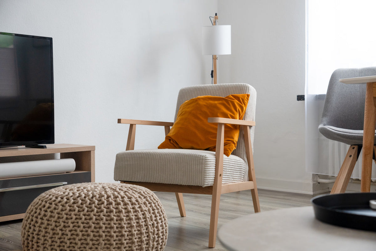 Reed diffuser styled in a living room