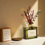 SAUSSAVITA Sandalwood Ancient Ember reed diffuser in a styled scene