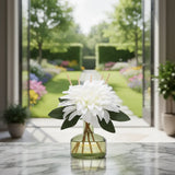 SAUSSAVITA Morning Dewgrass reed diffuser in a garden setting