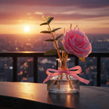 SAUSSAVITA Velvet Rose Oudh reed diffuser in an outdoor setting